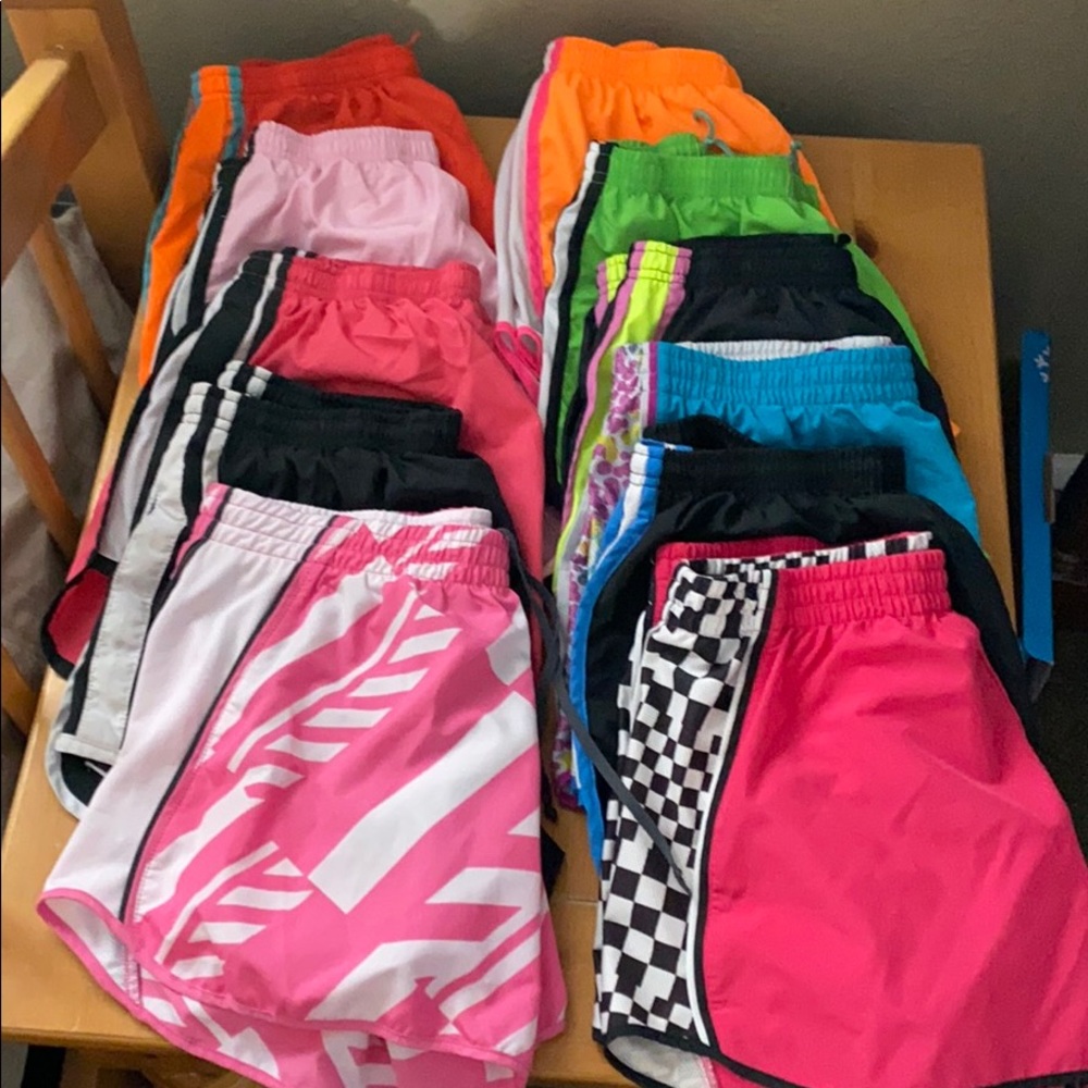 11 pairs of Nike Tempo shorts